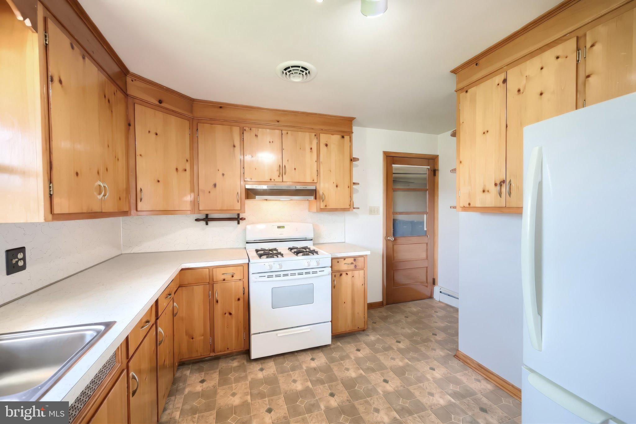 860 Witmer Road York, PA 17406 - Photo 13 of 40 Charming kitchen with warm wood accents.