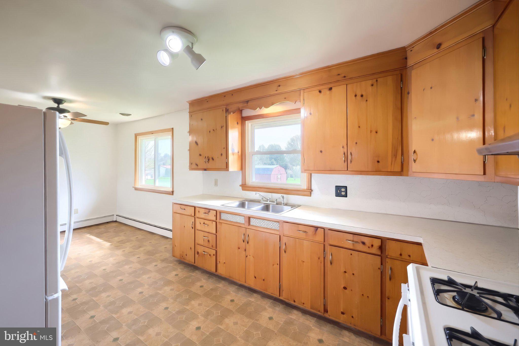 860 Witmer Road York, PA 17406 - Photo 14 of 40 Warm wooden kitchen with natural light.