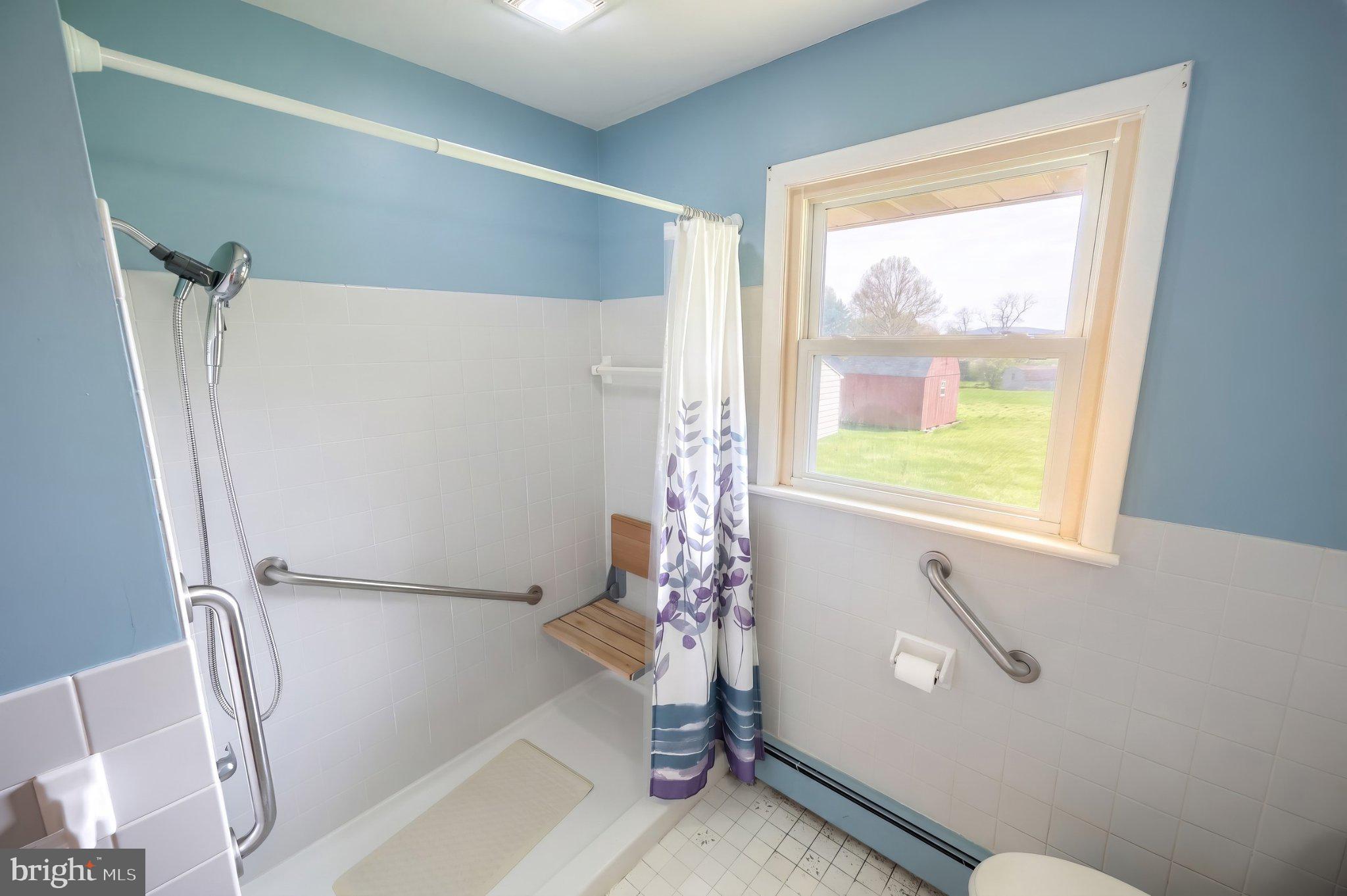 860 Witmer Road York, PA 17406 - Photo 17 of 40 Bright and airy accessible bathroom.
