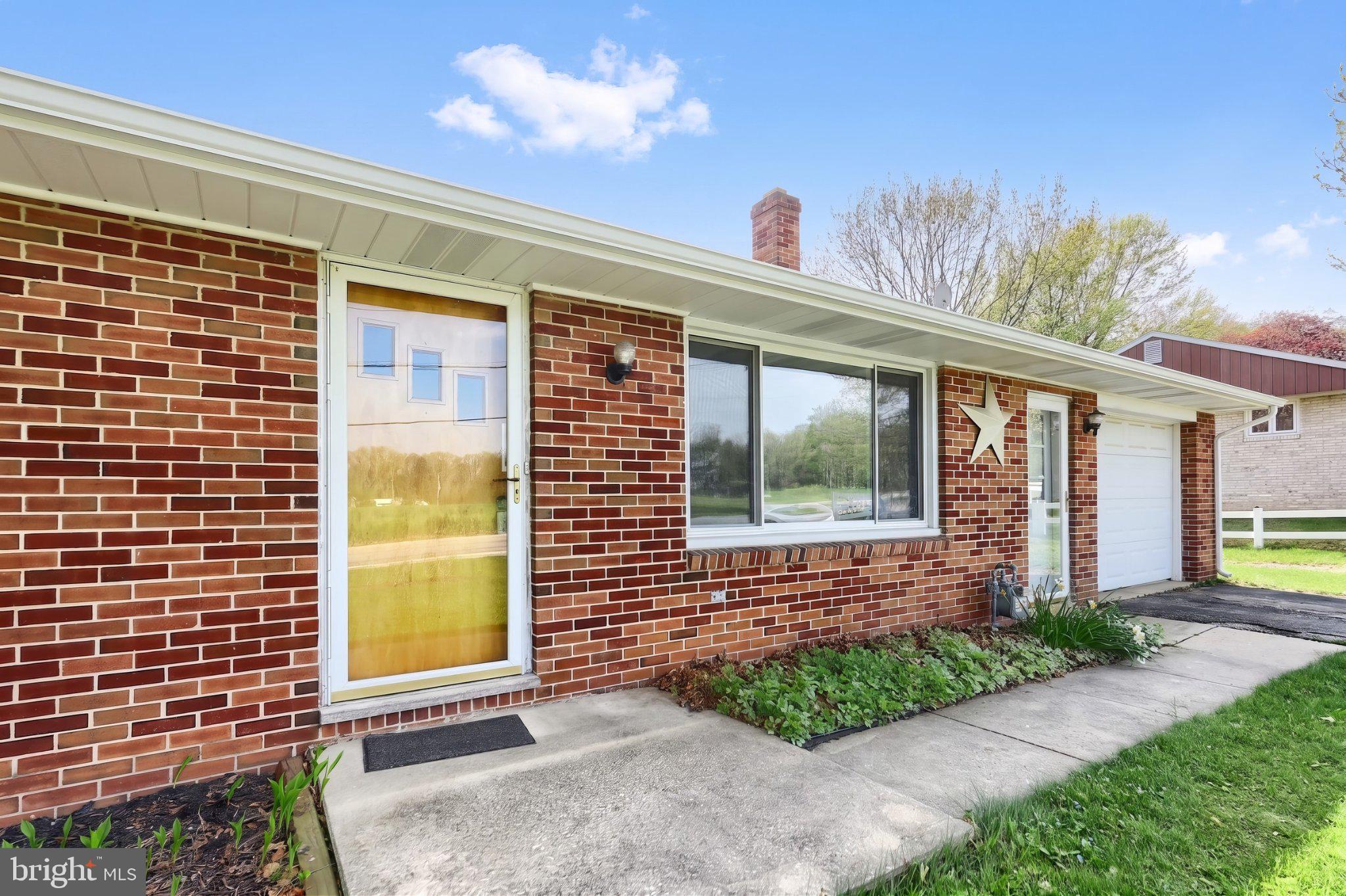 860 Witmer Road York, PA 17406 - Photo 2 of 40 Charming brick facade with inviting entry.