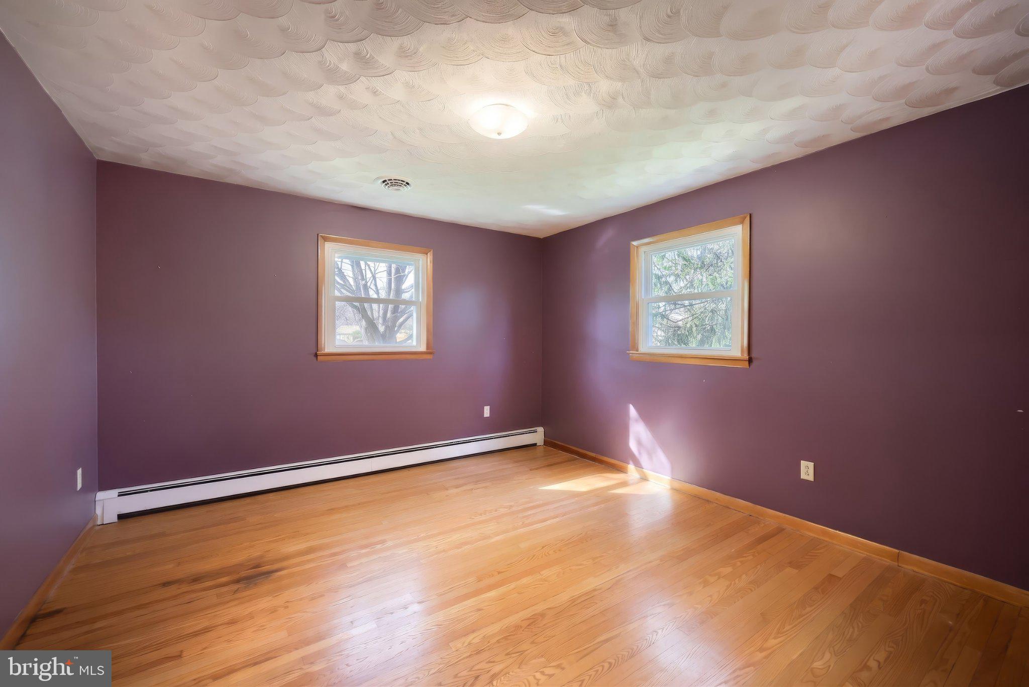 860 Witmer Road York, PA 17406 - Photo 21 of 40 Bright, airy space with purple walls.