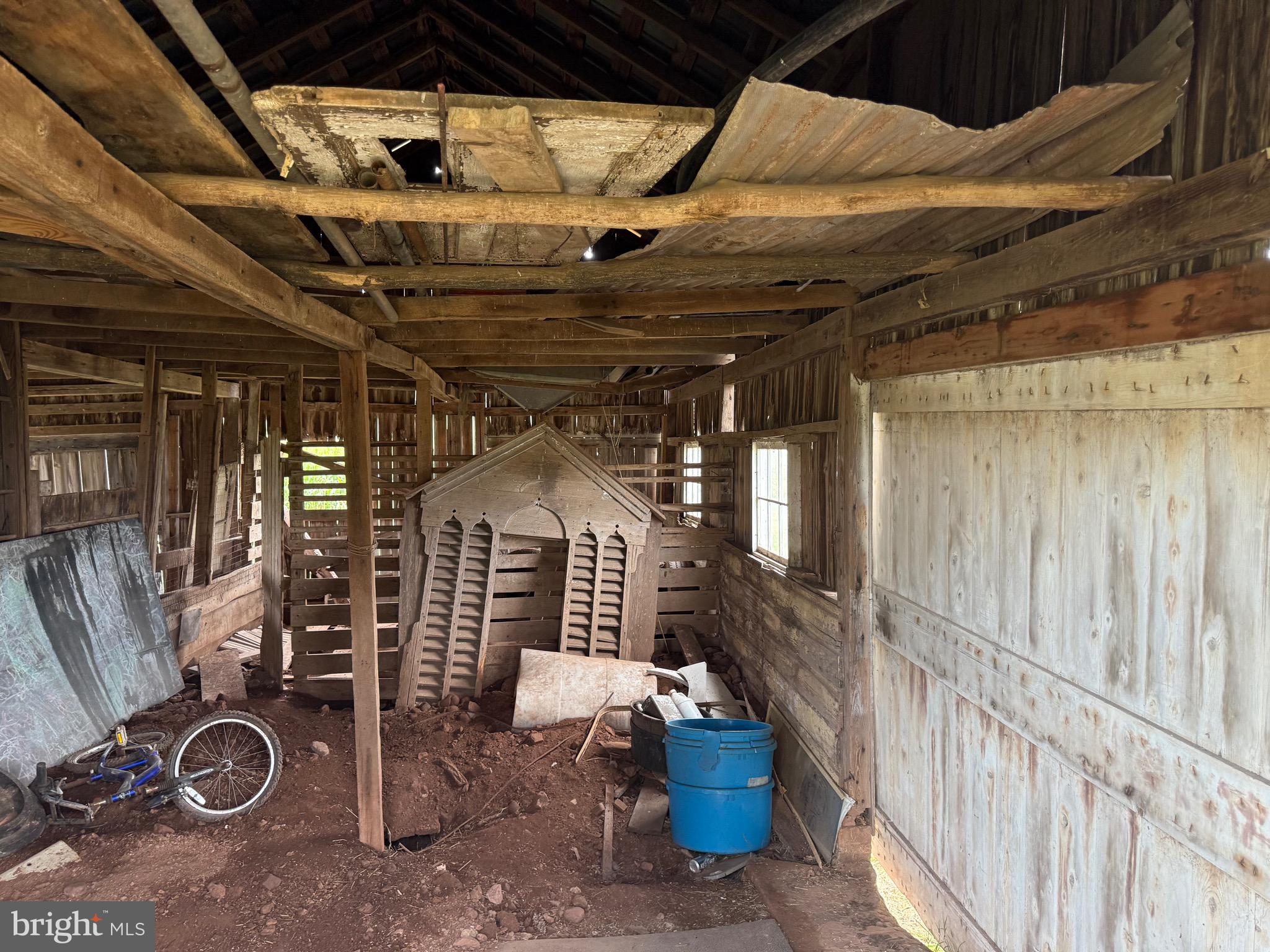 1309 Trevanion Road Union Bridge, MD 21791 - Photo 20 of 70 a view of an empty room with wooden floor