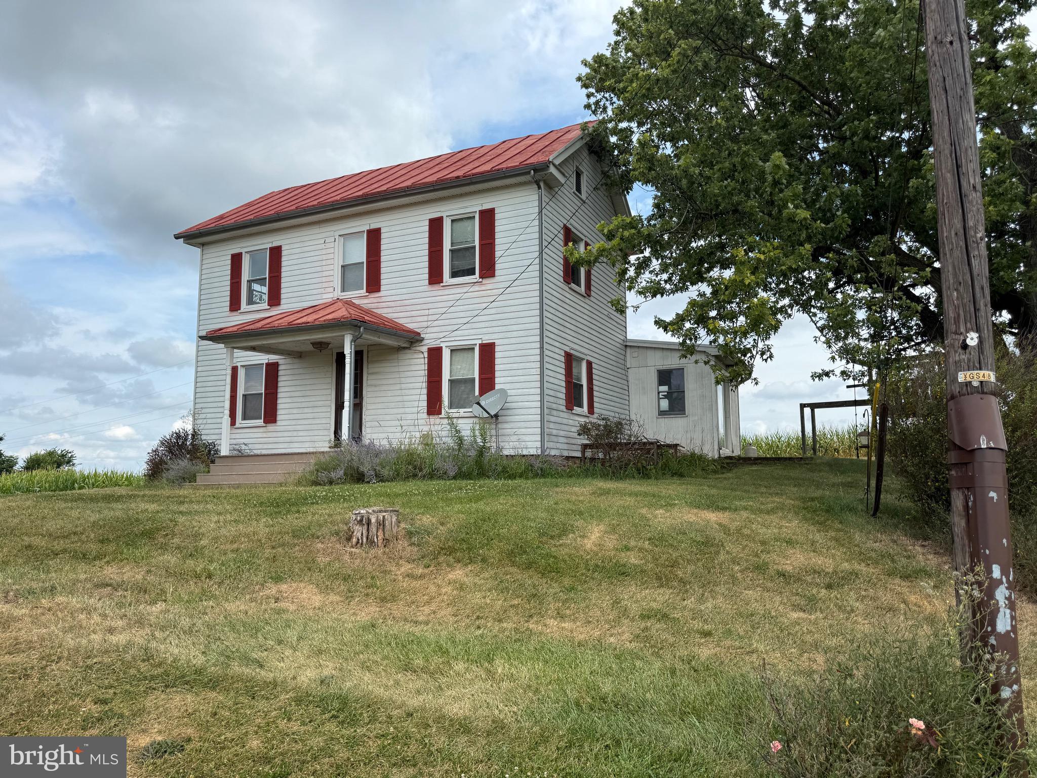 1309 Trevanion Road Union Bridge, MD 21791 - Photo 2 of 70 a front view of a house with a garden
