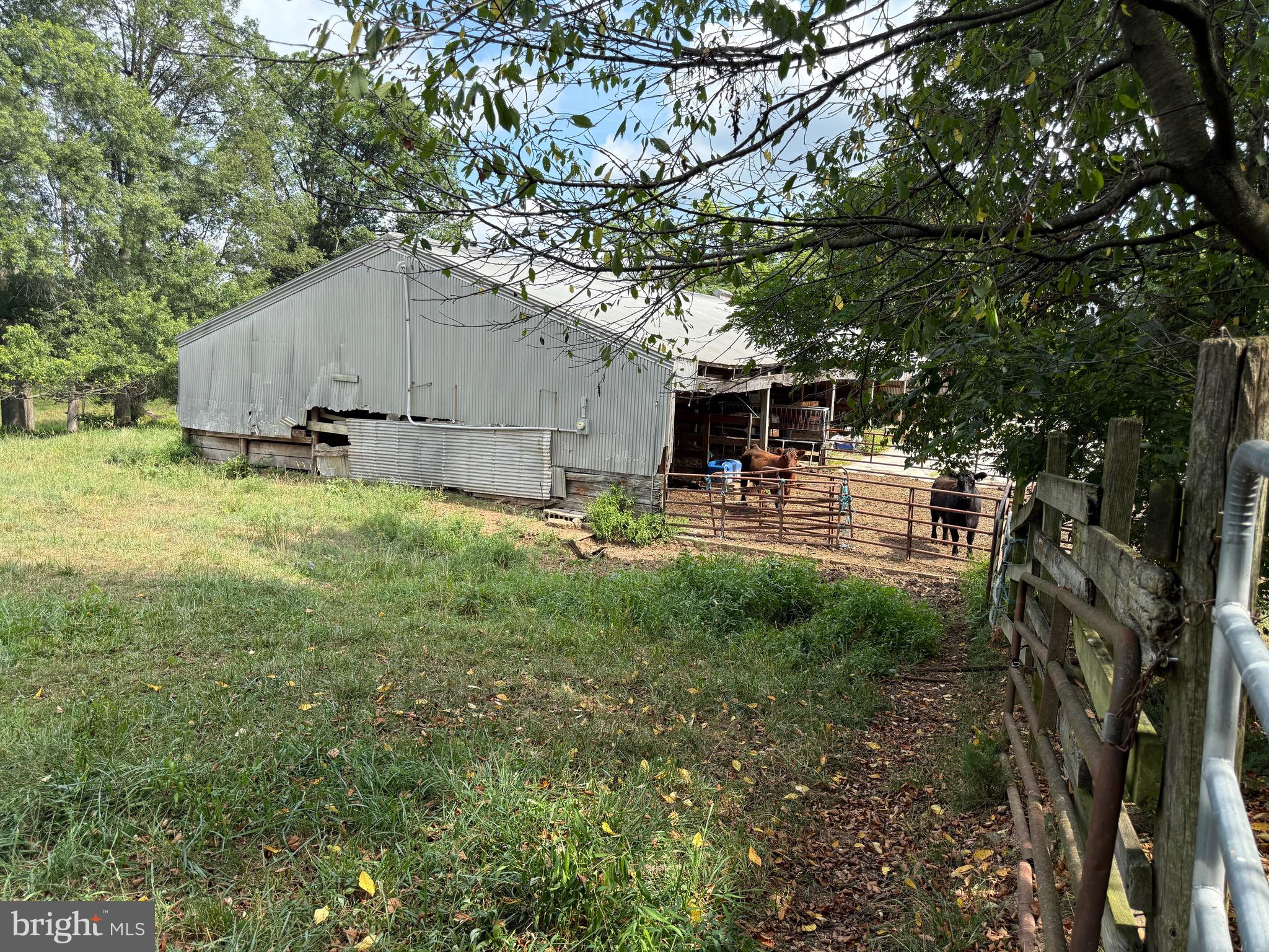 1309 Trevanion Road Union Bridge, MD 21791 - Photo 47 of 70 a backyard of a house with yard and outdoor seating