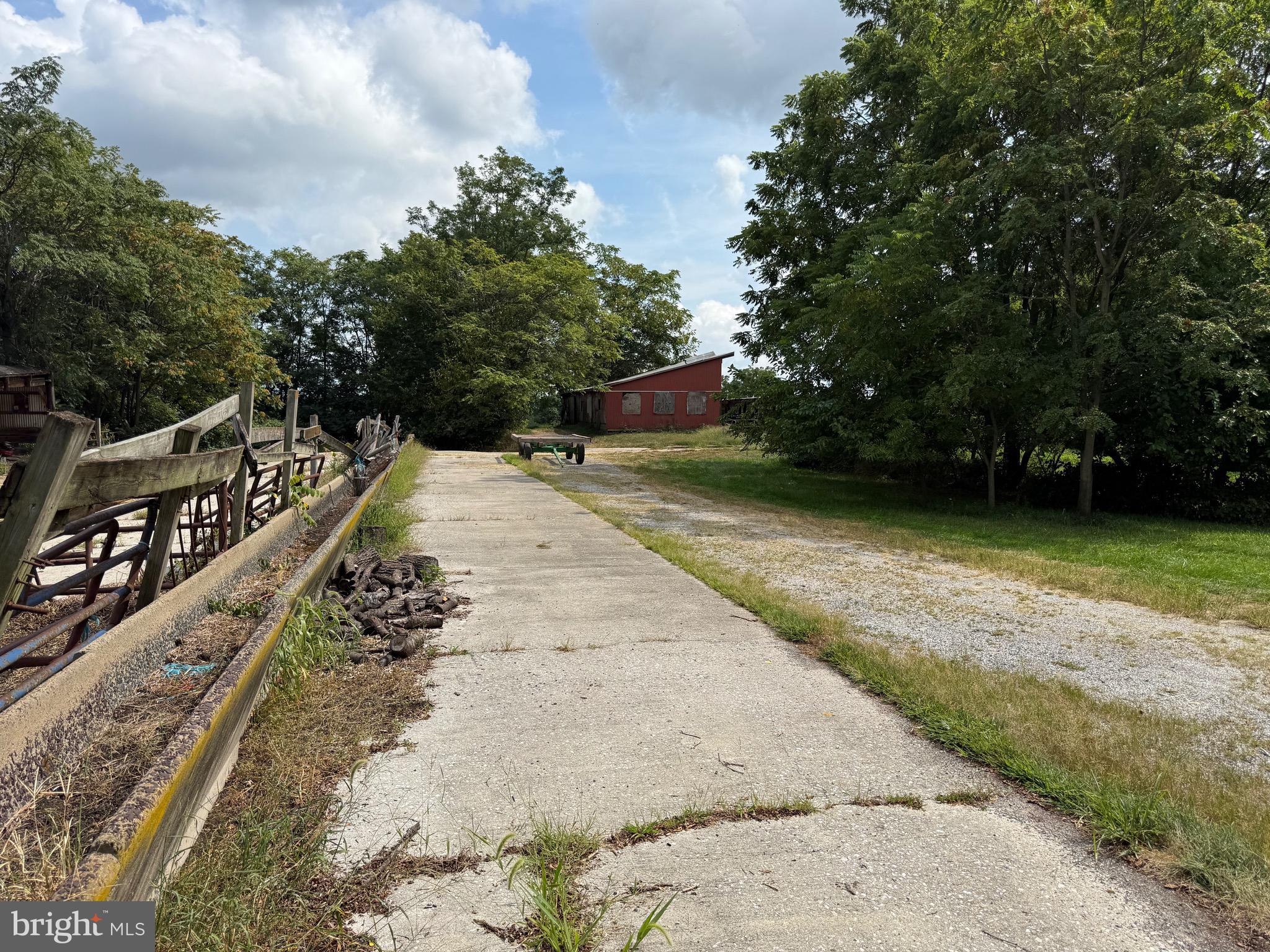 1309 Trevanion Road Union Bridge, MD 21791 - Photo 51 of 70 a view of a pathway with a wrought fence