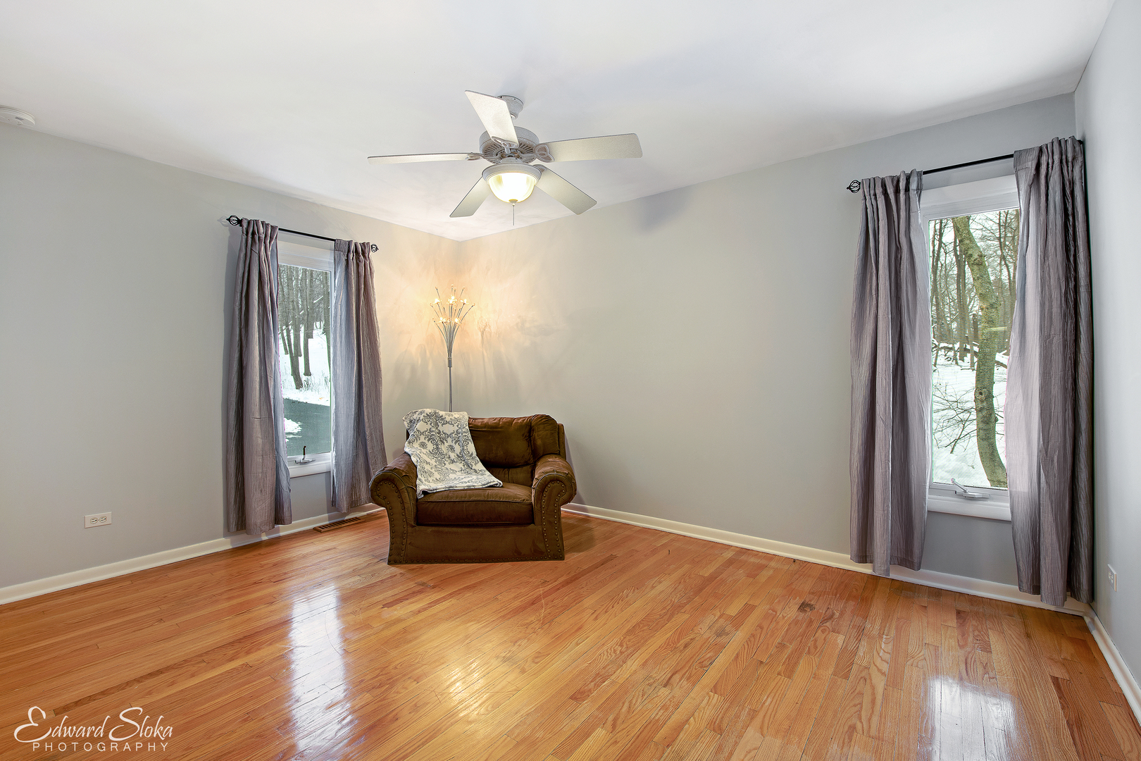 178 Stonegate Road Trout Valley, IL 60013 - Photo 18 of 24 a view of empty room with wooden floor and fan