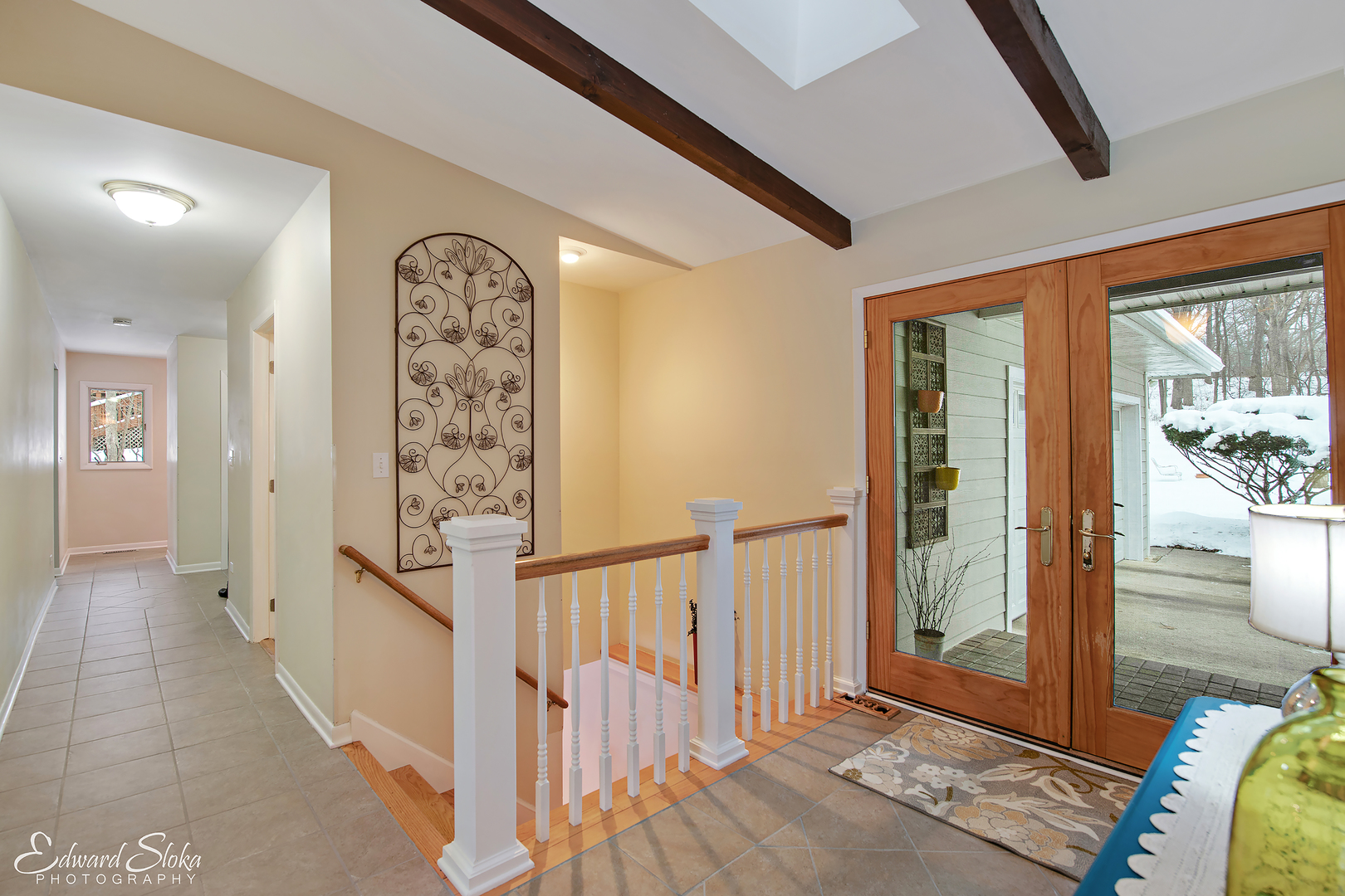 178 Stonegate Road Trout Valley, IL 60013 - Photo 22 of 24 a view of a hallway with wooden floor and stairs