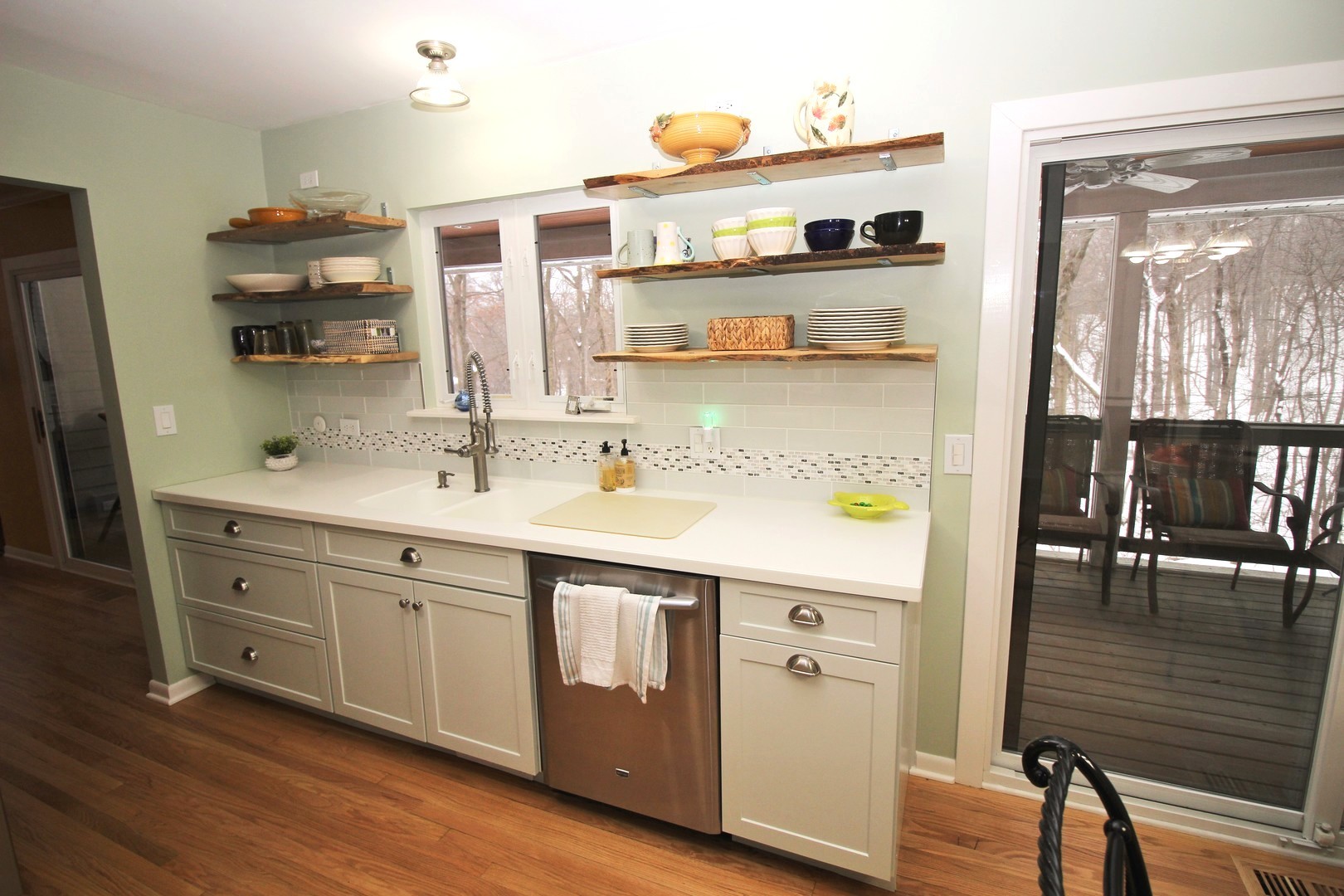 178 Stonegate Road Trout Valley, IL 60013 - Photo 10 of 24 a kitchen with a sink cabinets and wooden floor