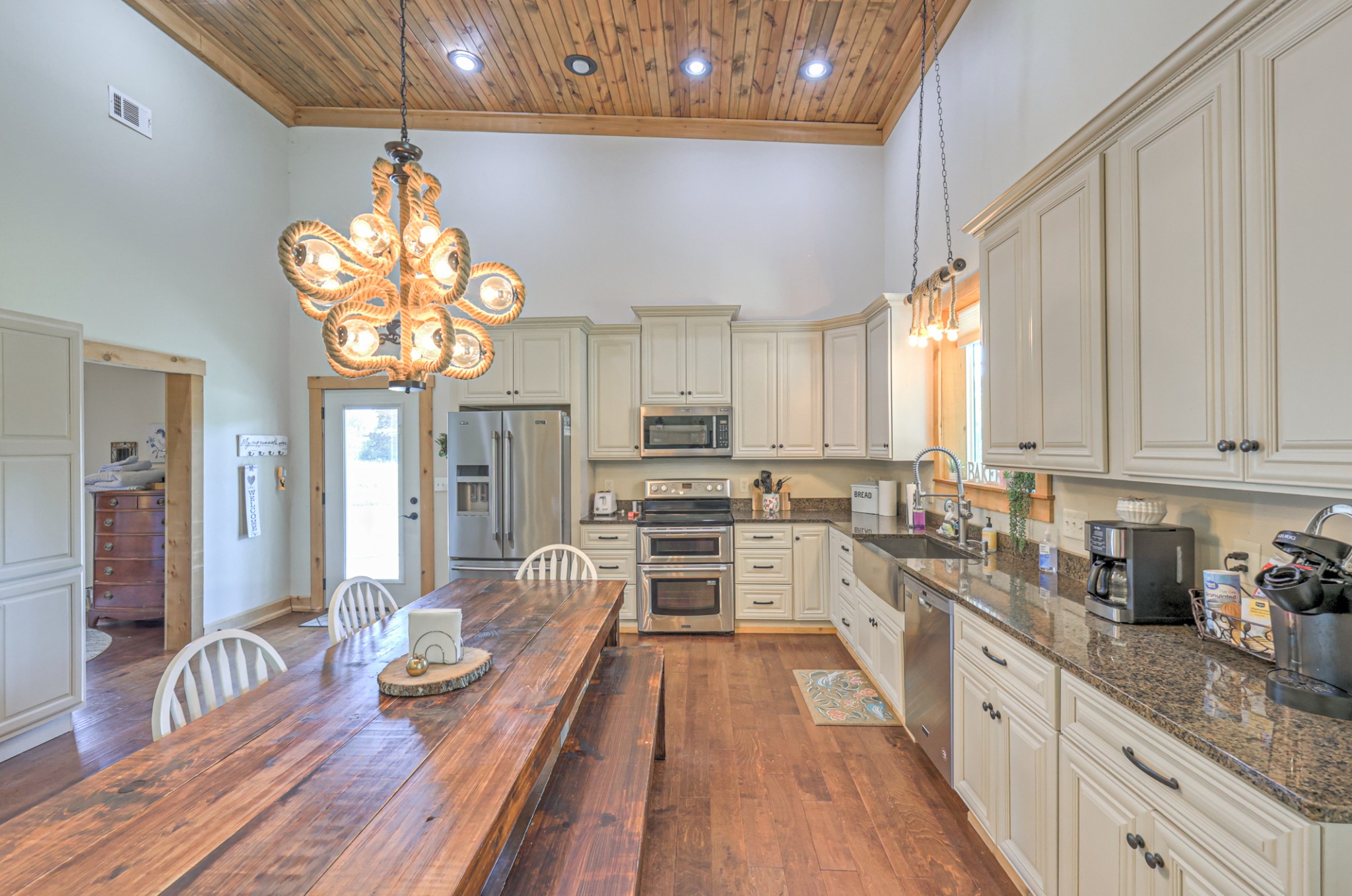5542 Southeast Tater Peeler Road Lebanon, TN 37090 - Photo 11 of 61 a large kitchen with a large window a counter space a sink and stainless steel appliances