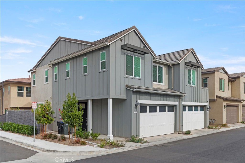 a front view of a house with yard