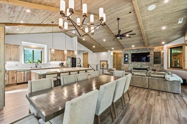 a living room with fireplace furniture and a flat screen tv