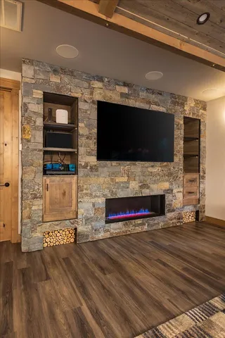 a bathroom with double vanity and a bathtub