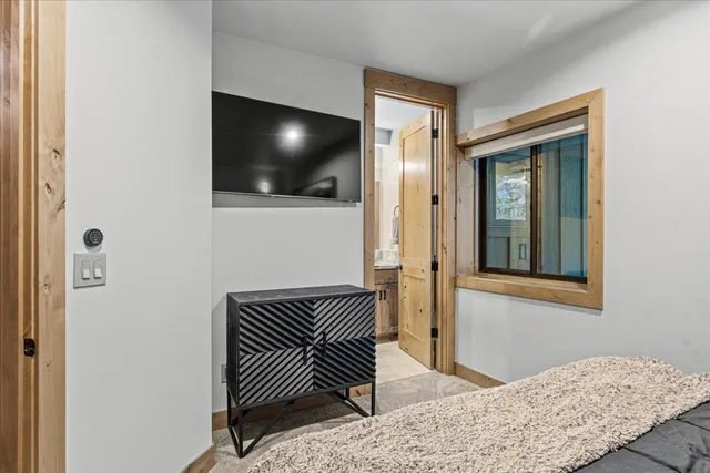 a kitchen with a stove a sink and a microwave