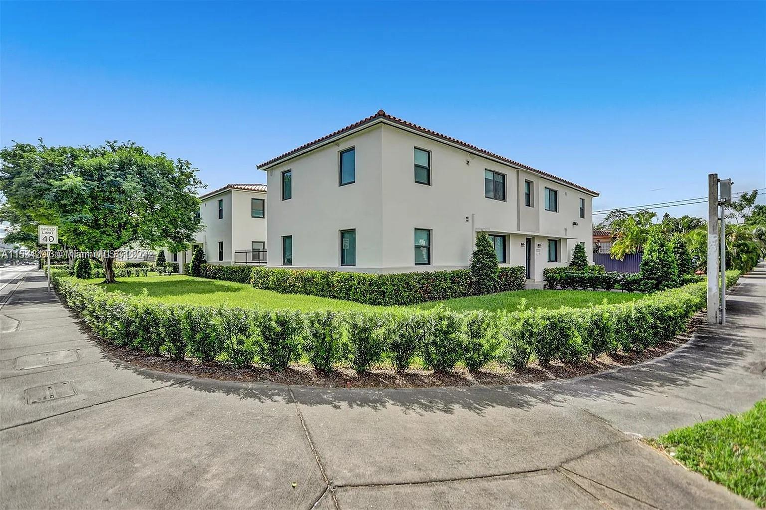 4203 Southwest 15th Street, Unit 2 Miami, FL 33145 - Photo 11 of 13 a view of a house with a yard