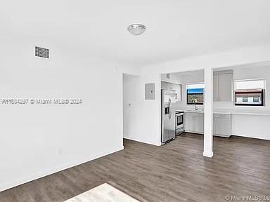 4203 Southwest 15th Street, Unit 2 Miami, FL 33145 - Photo 3 of 13 a view of empty room with wooden floor