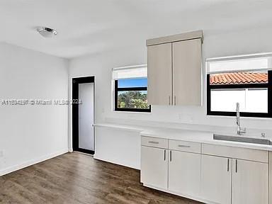 4203 Southwest 15th Street, Unit 2 Miami, FL 33145 - Photo 4 of 13 a bathroom with a sink and a mirror