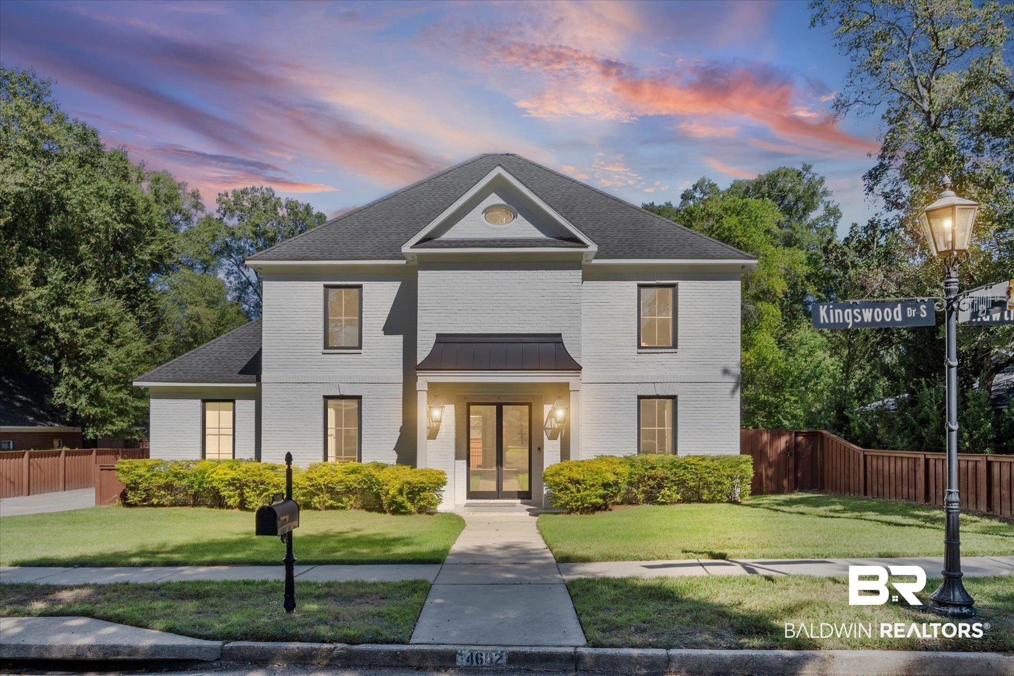 4602 Kingswood Drive Mobile, AL 36608 - Photo 1 of 45 View of front of home featuring brick siding, french doors, a standing seam roof, a shingled roof, and a metal roof