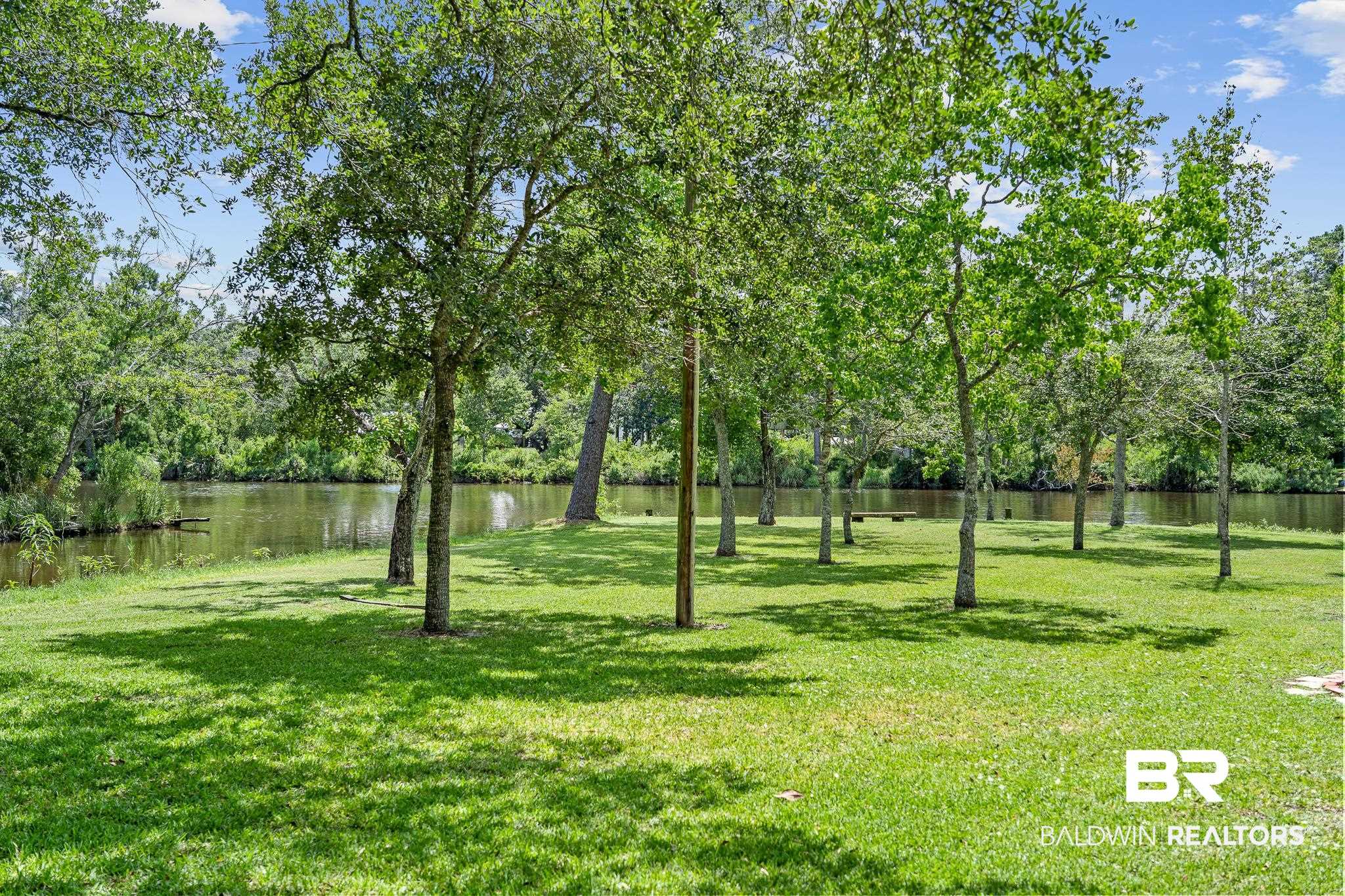 18513 Yacht Club Road Foley, AL 36535 - Photo 31 of 53 View of yard featuring a water view