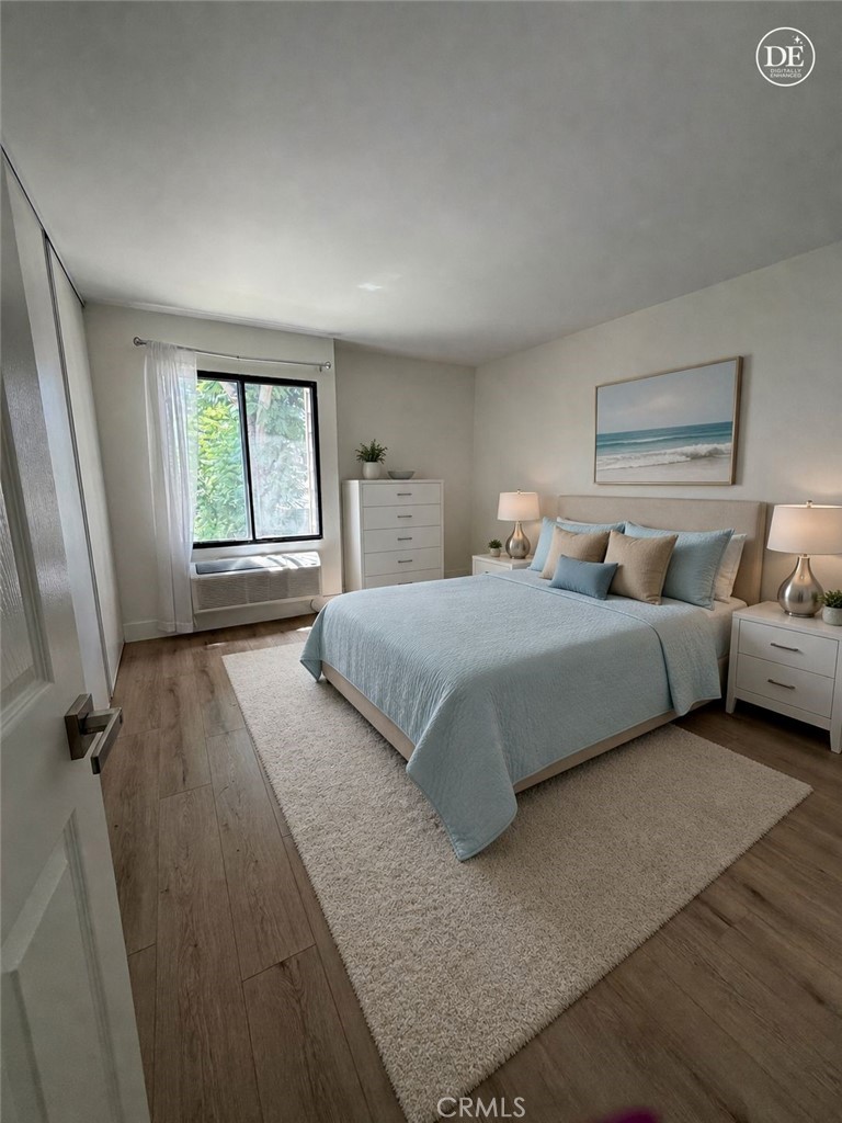 3535 Banbury Drive, Unit 178 Riverside, CA 92505 - Photo 12 of 26 a bedroom with a bed and a large window