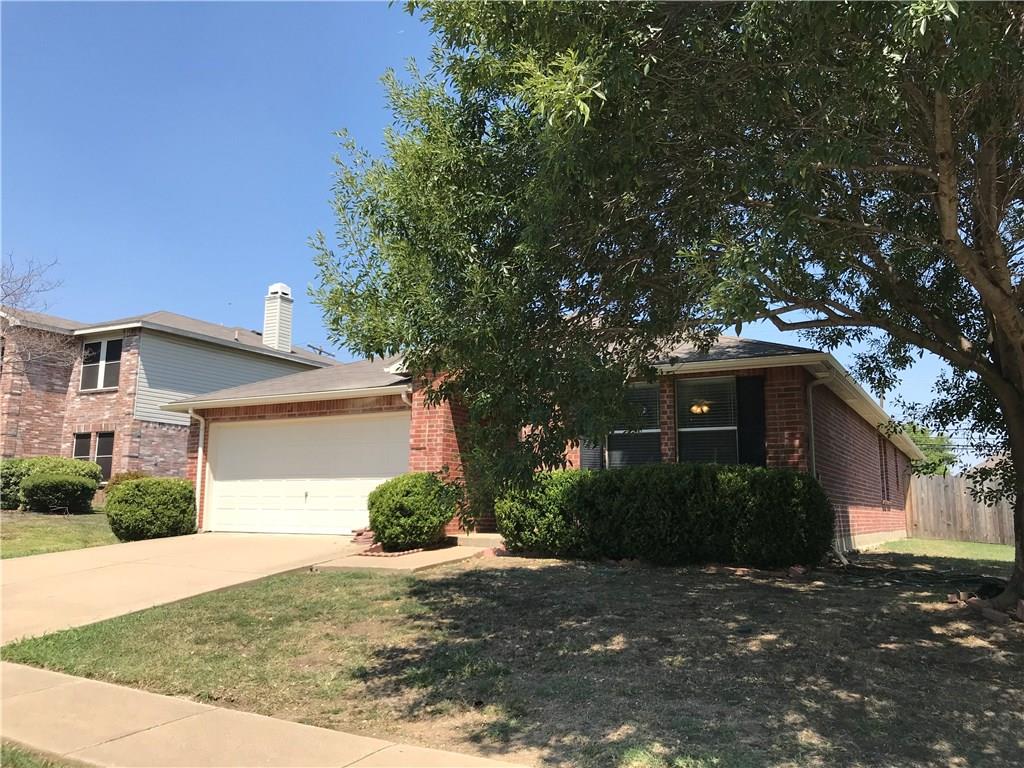 941 Carthage Way Arlington, TX 76017 - Photo 1 of 1 a front view of a house with a yard and garage
