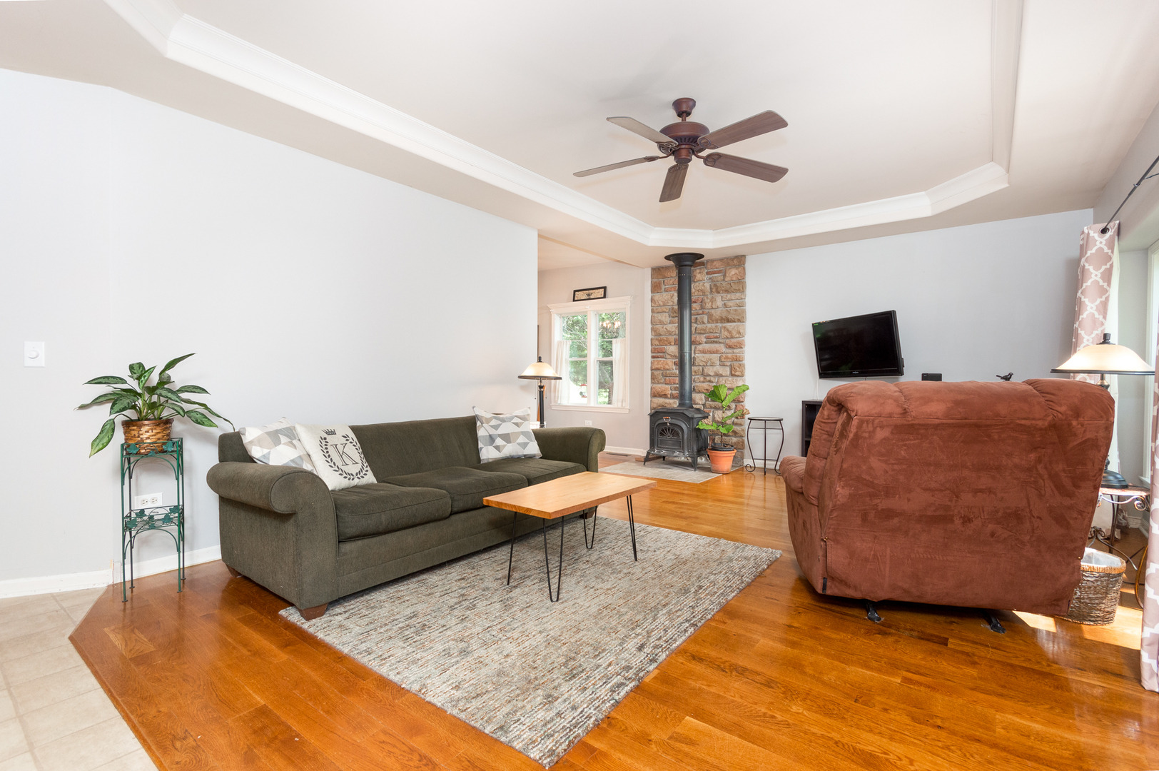 16463 Plank Road Sycamore, IL 60178 - Photo 13 of 36 a living room with furniture and a flat screen tv