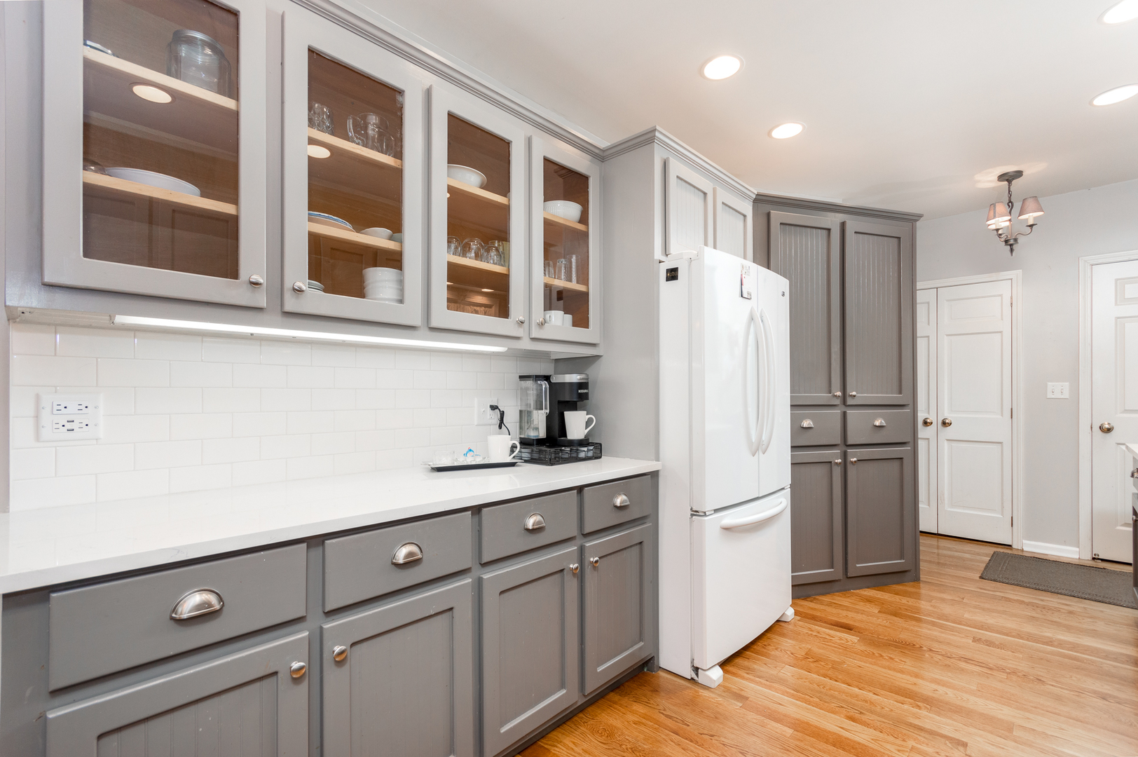 16463 Plank Road Sycamore, IL 60178 - Photo 19 of 36 a kitchen with a refrigerator and cabinets