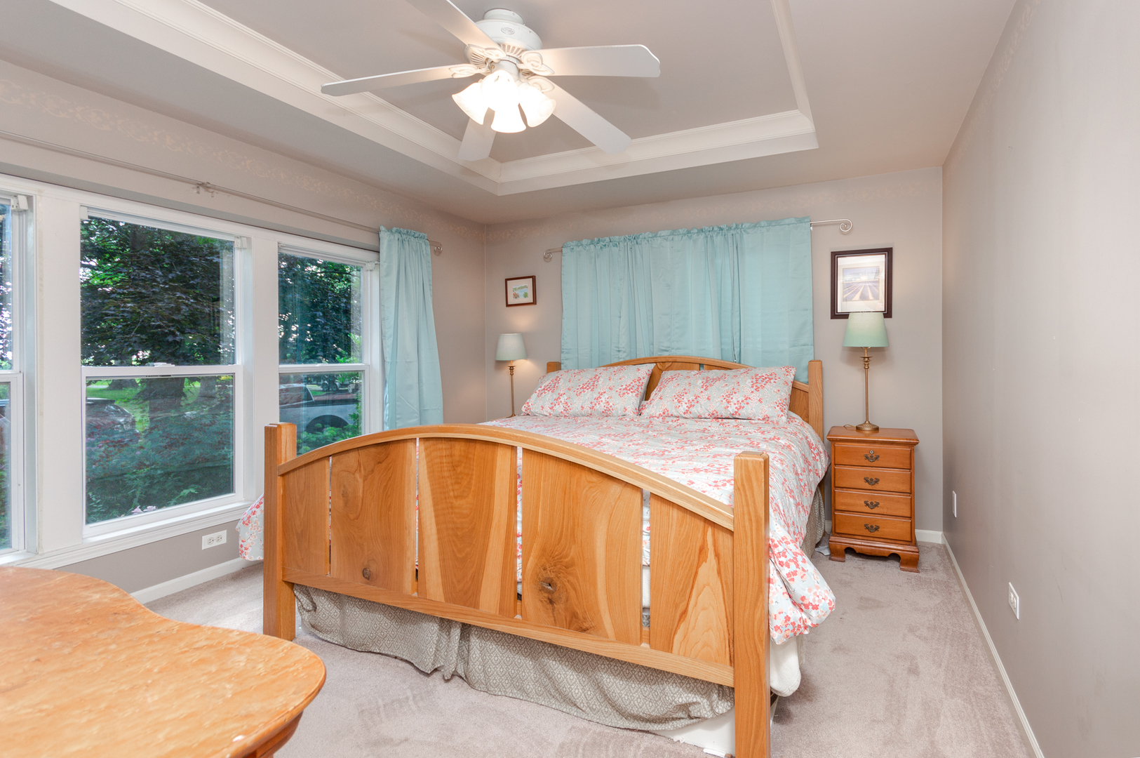 16463 Plank Road Sycamore, IL 60178 - Photo 21 of 36 a bed sitting in a spacious bedroom next to a window