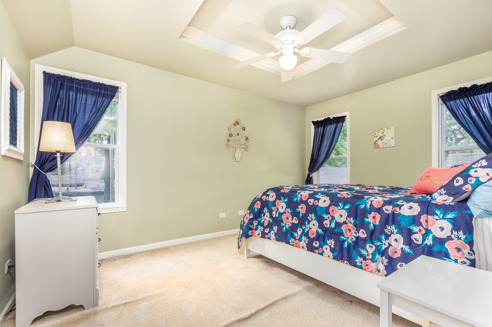 16463 Plank Road Sycamore, IL 60178 - Photo 28 of 36 a bedroom with a bed and a chandelier