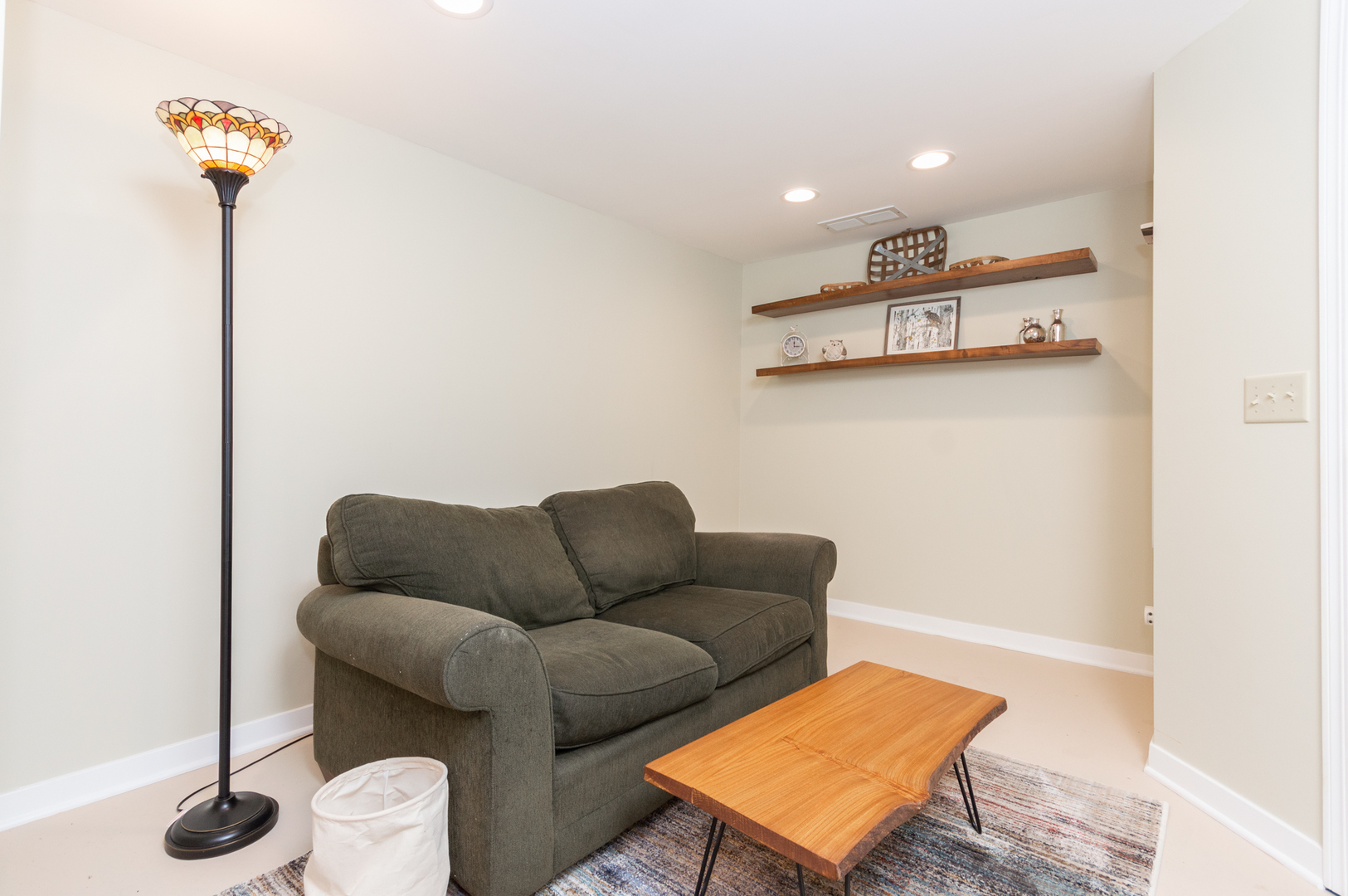 16463 Plank Road Sycamore, IL 60178 - Photo 30 of 36 a living room with furniture and a wooden floor