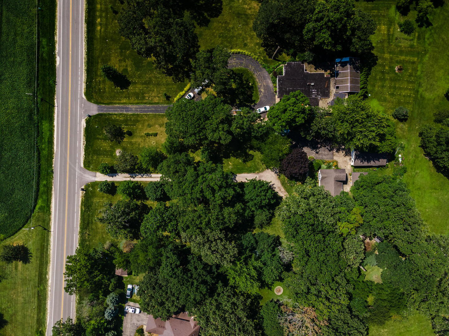 16463 Plank Road Sycamore, IL 60178 - Photo 36 of 36 an aerial view of residential house with outdoor space and trees all around