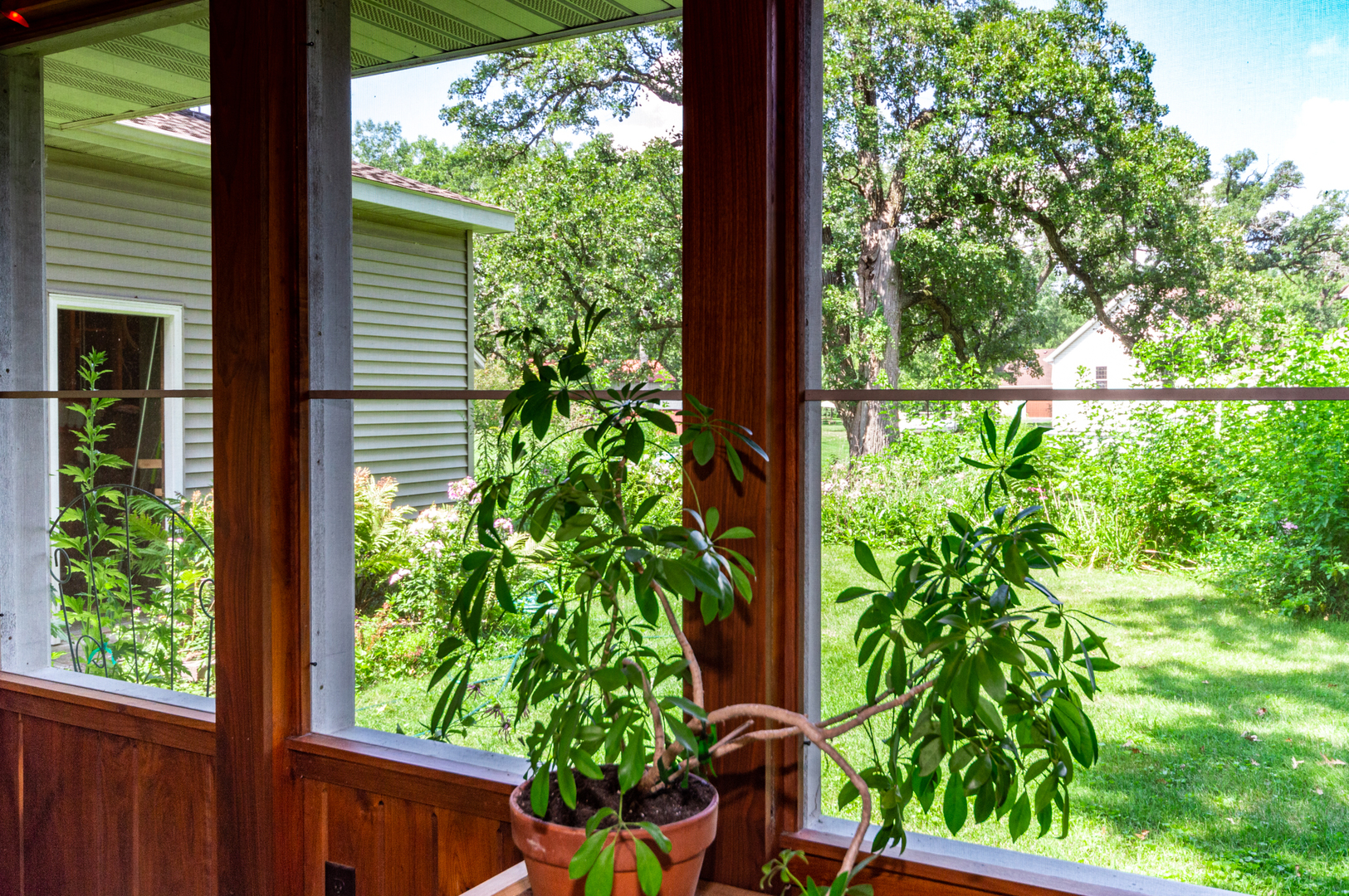 16463 Plank Road Sycamore, IL 60178 - Photo 6 of 36 a view of a garden from a window