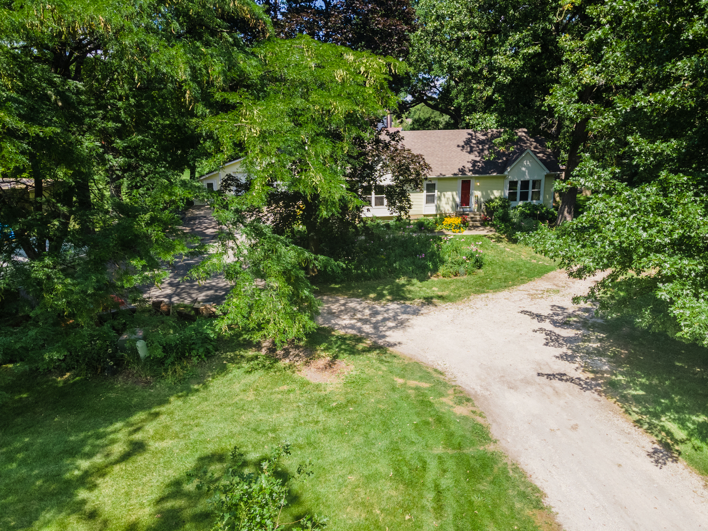 16463 Plank Road Sycamore, IL 60178 - Photo 7 of 36 a view of a garden with a tree