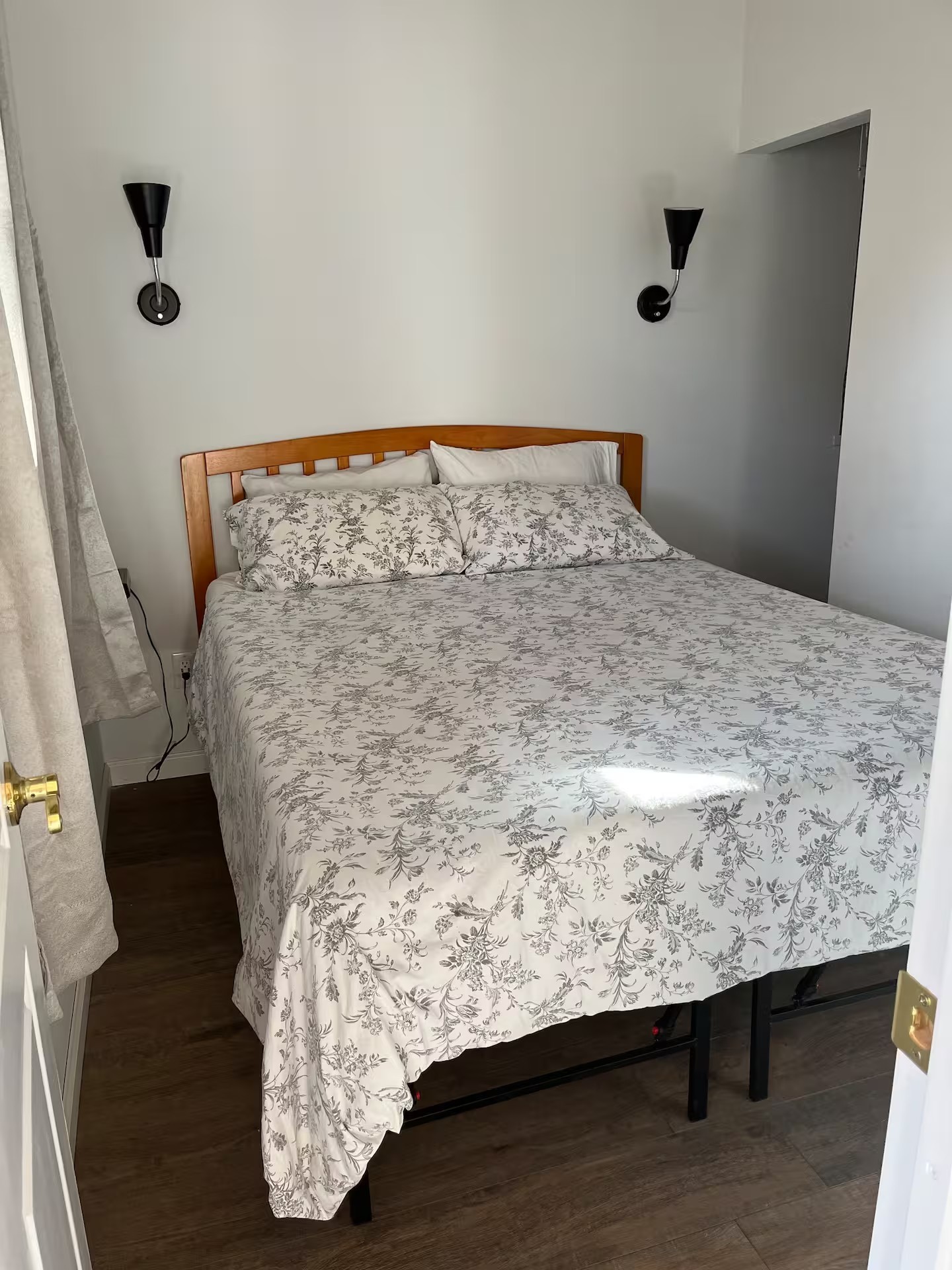 1490 Ford Road Baxter, TN 38544 - Photo 15 of 24 a bed sitting in a bedroom next to a window