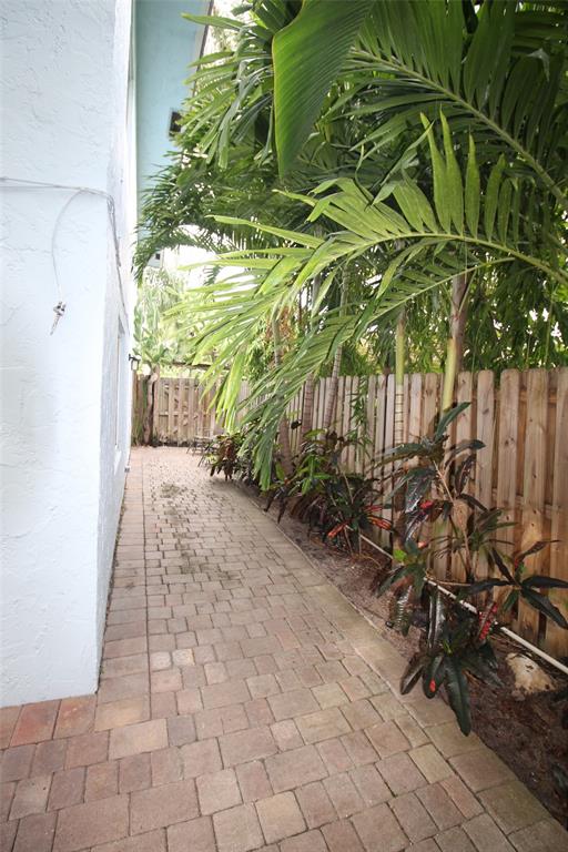 820 Northeast 28th Street, Unit 1 Wilton Manors, FL 33334 - Photo 11 of 17 a view of a backyard