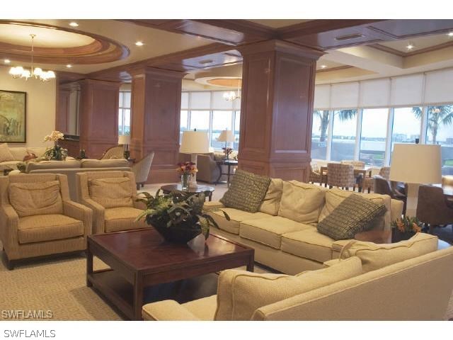 2104 West First Street, Unit 3204 Fort Myers, FL 33901 - Photo 11 of 21 a living room with furniture and a large window