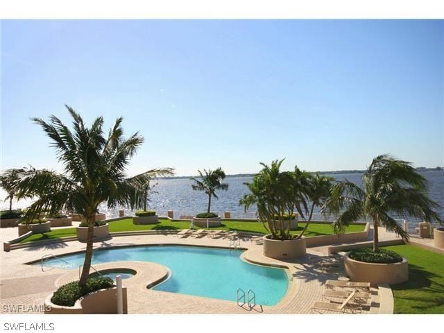 2104 West First Street, Unit 3204 Fort Myers, FL 33901 - Photo 9 of 21 a view of swimming pool and lake view