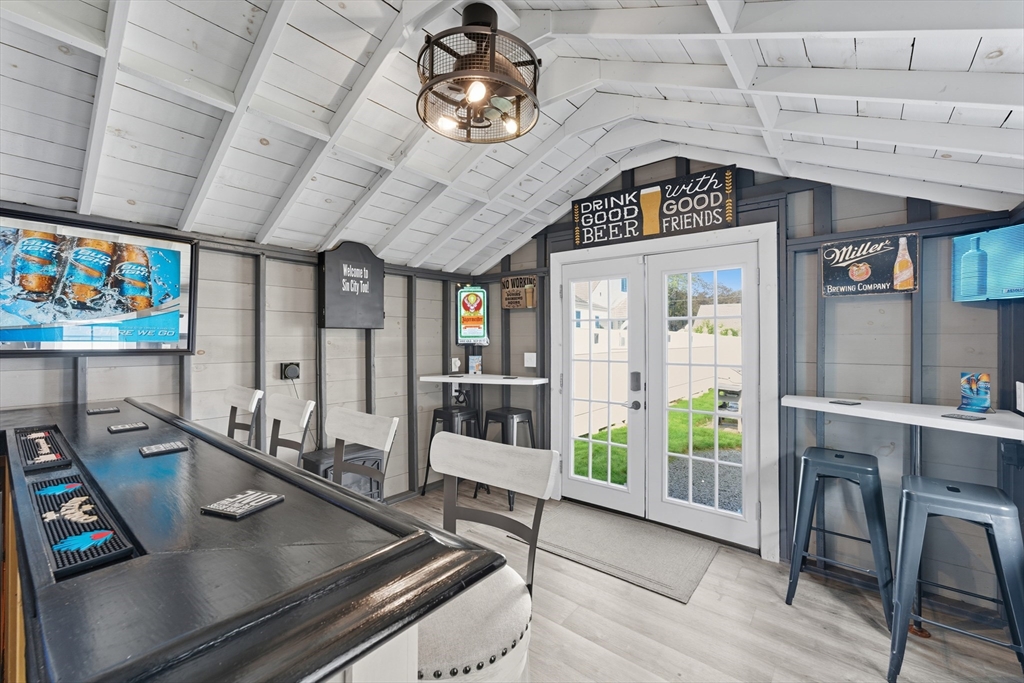 53 Druids Lane West Springfield, MA 01089 - Photo 12 of 42 a view of a dining room with furniture a chandelier and wooden floor