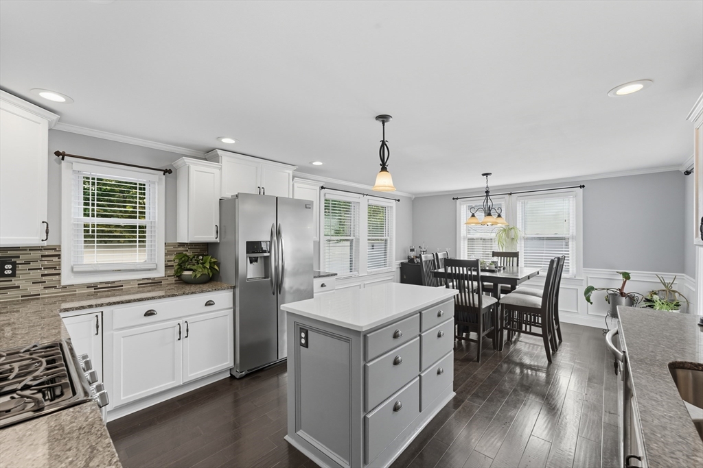53 Druids Lane West Springfield, MA 01089 - Photo 13 of 42 a kitchen with sink cabinets and wooden floor