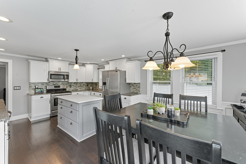 53 Druids Lane West Springfield, MA 01089 - Photo 14 of 42 a kitchen with stainless steel appliances granite countertop a stove and refrigerator