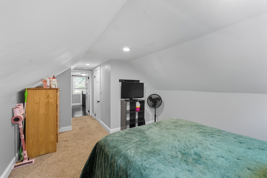 53 Druids Lane West Springfield, MA 01089 - Photo 35 of 42 a bedroom with a bed and a mirror