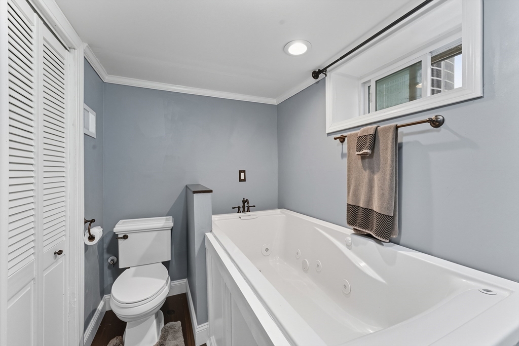 53 Druids Lane West Springfield, MA 01089 - Photo 39 of 42 a bathroom with a sink and toilet