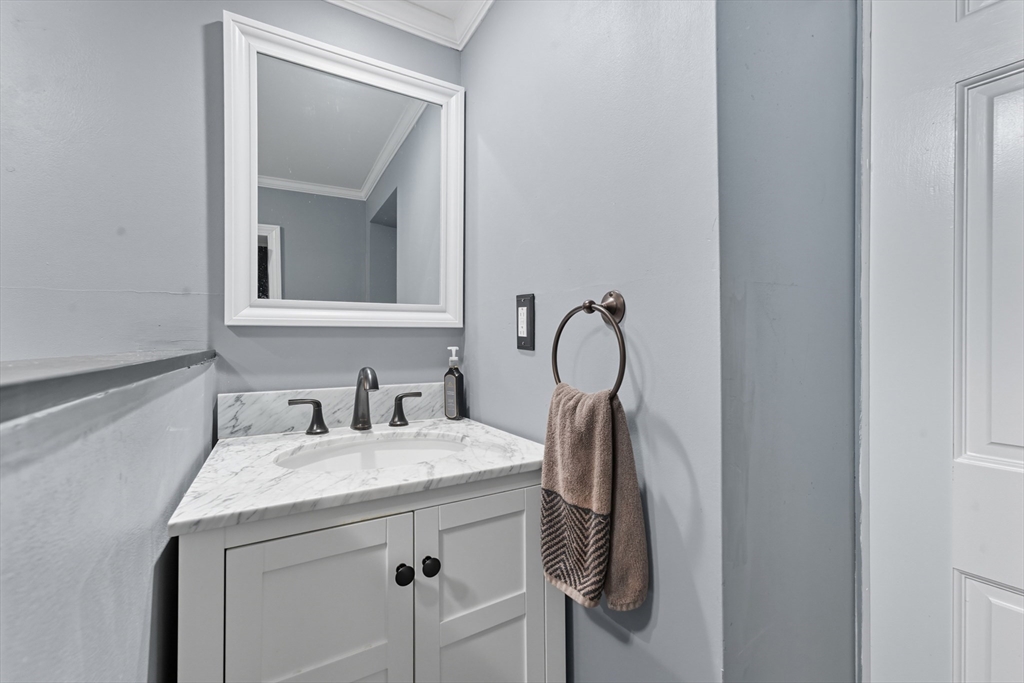 53 Druids Lane West Springfield, MA 01089 - Photo 40 of 42 a bathroom with a sink and a mirror