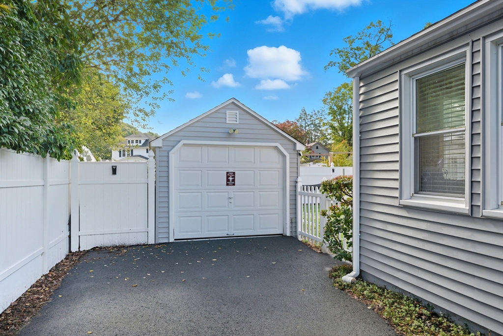 53 Druids Lane West Springfield, MA 01089 - Photo 4 of 42 a view of a house with a yard and garage