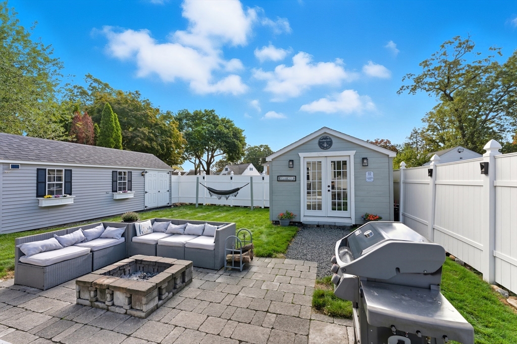 53 Druids Lane West Springfield, MA 01089 - Photo 6 of 42 a view of a patio with chair and table and chairs