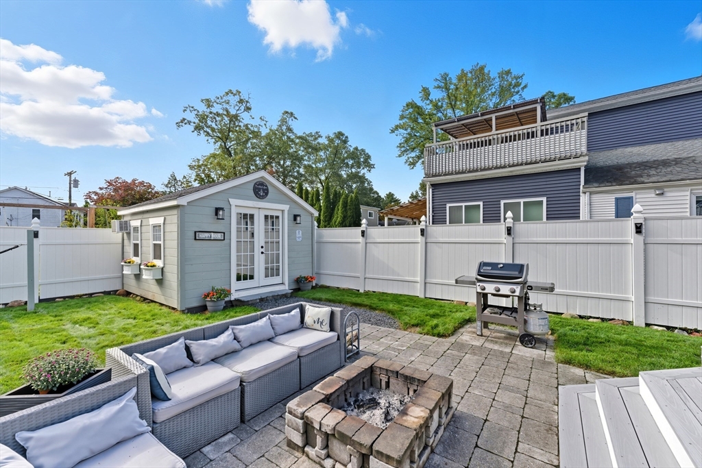 53 Druids Lane West Springfield, MA 01089 - Photo 7 of 42 a view of a house with a yard and furniture