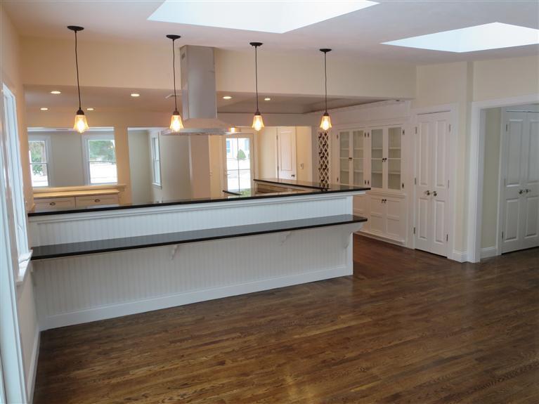 138 South Main Street Centerville, MA 02632 - Photo 13 of 35 a large bathroom with a large mirror and sink