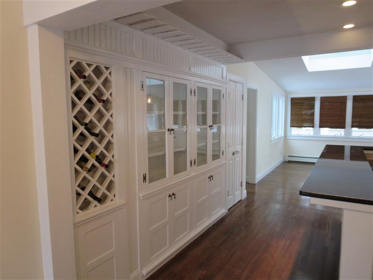 138 South Main Street Centerville, MA 02632 - Photo 14 of 35 a view of a hallway with wooden floor and windows