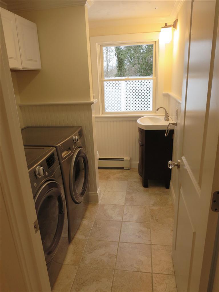 138 South Main Street Centerville, MA 02632 - Photo 19 of 35 a view of a storage & utility room with a window