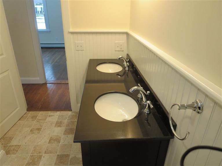 138 South Main Street Centerville, MA 02632 - Photo 20 of 35 a bathroom with a sink mirror vanity and toilet