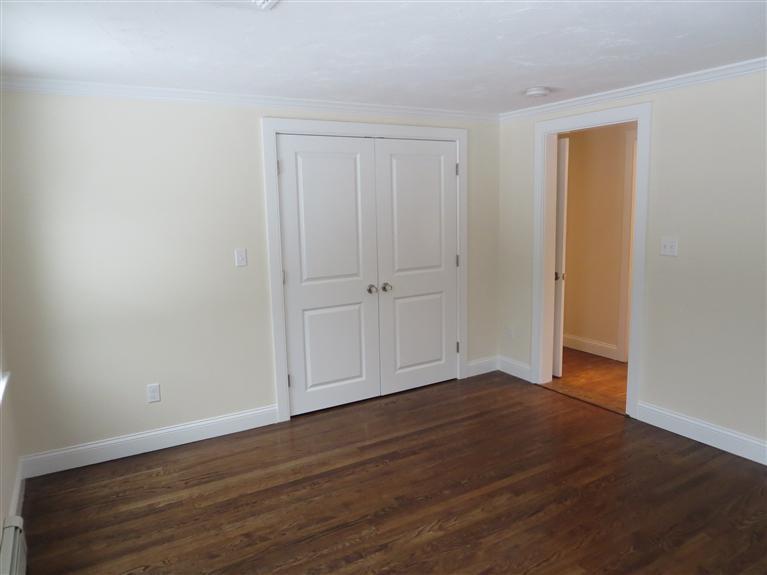 138 South Main Street Centerville, MA 02632 - Photo 24 of 35 a view of an empty room with wooden floor